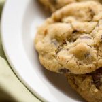 image of best ever vegan chocolate chip cookies by Cindy Newland with Intentionally Eat on a white plate