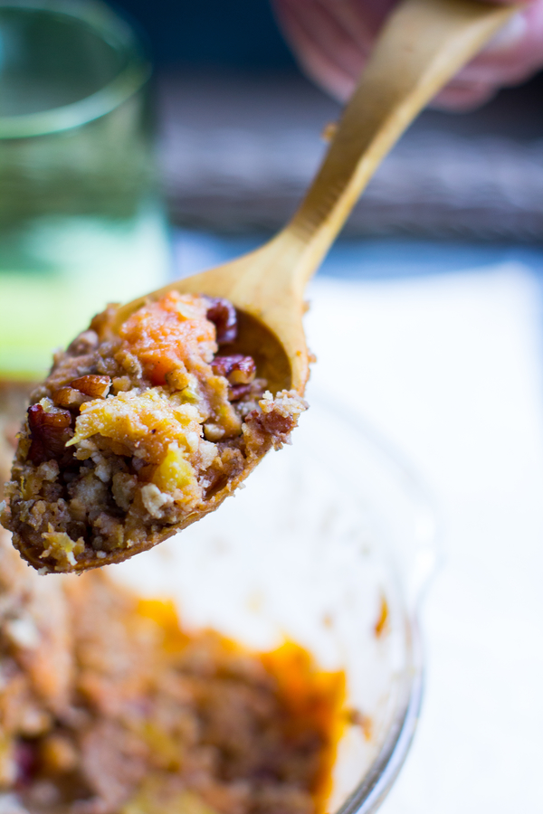 image of a wooden spoon full of the best ever sweet potato casserole by intentionally eat