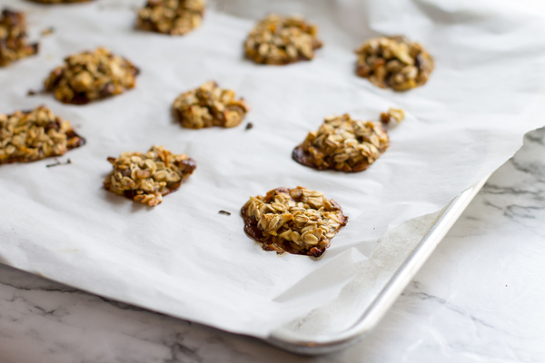 image of Irresistible apple pie protein cookies by intentionally eat with cindy newland on parchment paper on a cookie sheet
