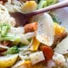 image of Roasted Veggie Pasta by Intentionally Eat with Cindy Newland in a white bowl with a gold fork