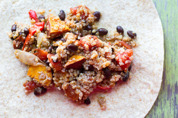 image of Quinoa Sweet Potato and Black Bean Burrito by Intentionally Eat with Cindy Newland in a flour tortilla