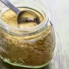 vegetable bouillon powder by intentionally eat with cindy newland in a glass jar with a tablespoon in it