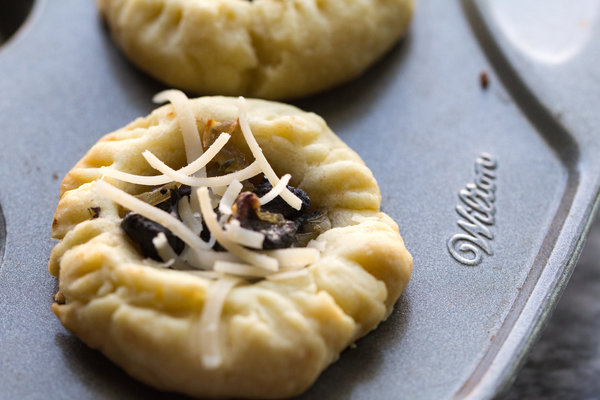 image of savory mushroom tarts by intentionally eat with Cindy Newland in a muffin tin
