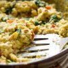 image of tasty tofu scramble by intentionally eat with cindy newland in a skillet with a spatula