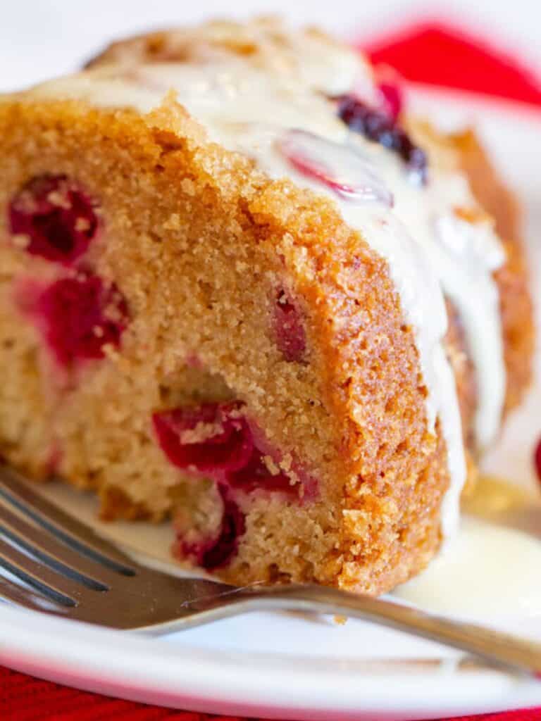 a slice of vegan Christmas cake with a fork