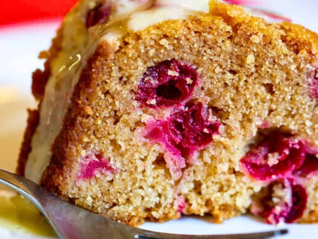 a slice of cranberry vegan Christmas Cake 