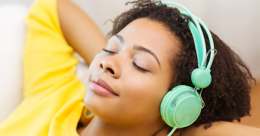 woman relaxing with headphones on