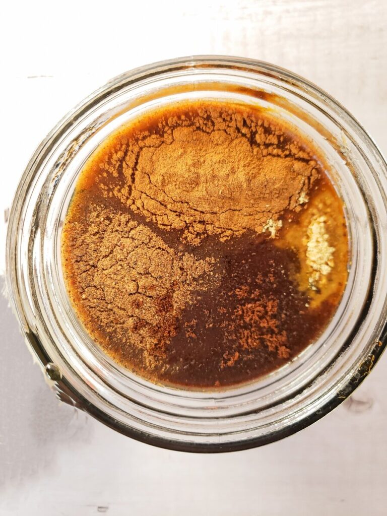 gingerbread syrup ingredients in a glass jar