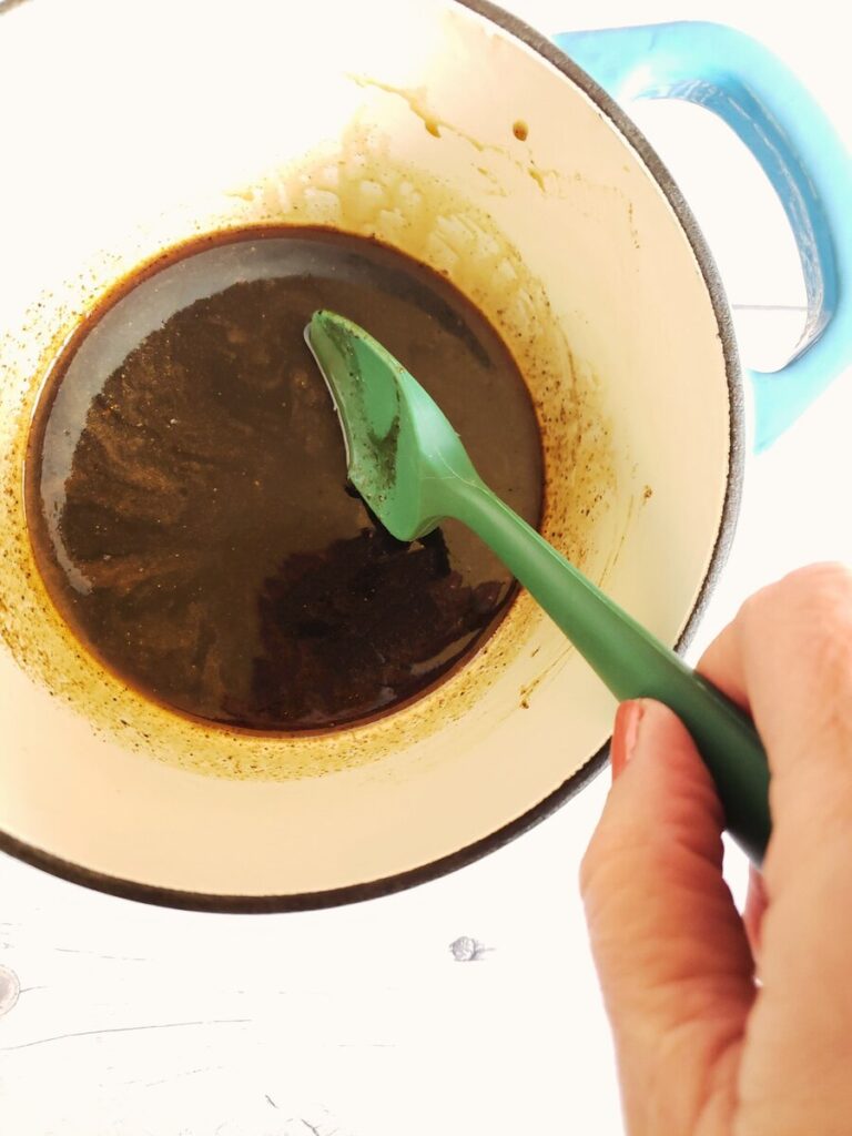 gingerbread syrup in a saucepan being stirred