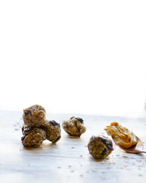 naturally sweetened energy bites with a tablespoon of nut butter