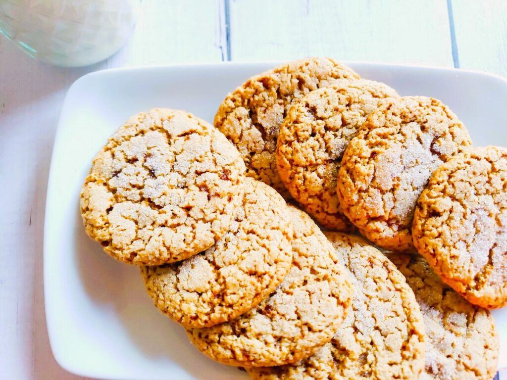 sugar free peanut butter cookies lined up on a plate