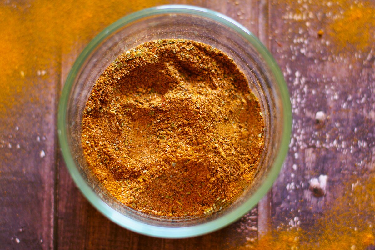 Indian curry powder spice blend in glass container