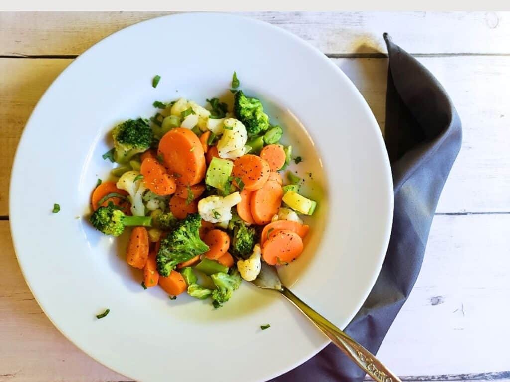 mixed vegetables in a white bowl