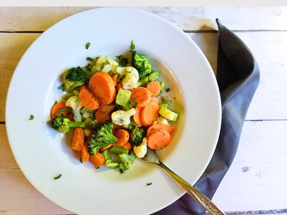 mixed vegetables in a white bowl