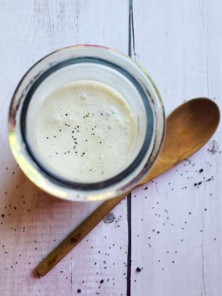 homemade poppyseed dressing in a glass jar