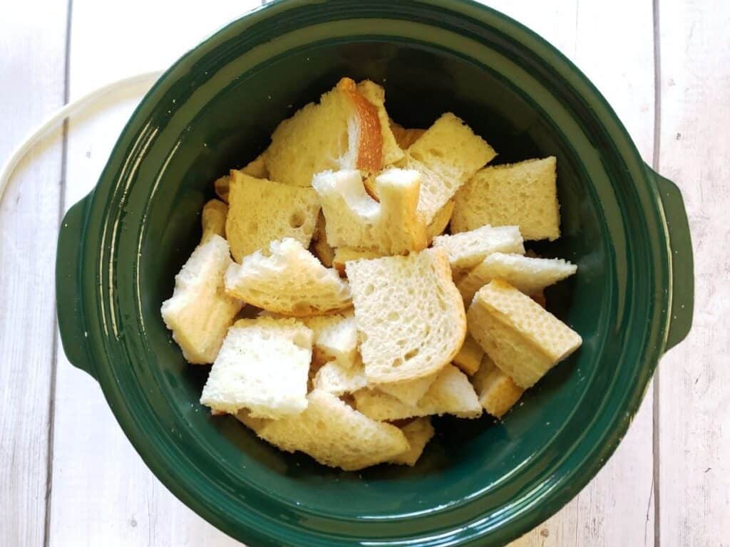 stale bread pieces in a slow cooker