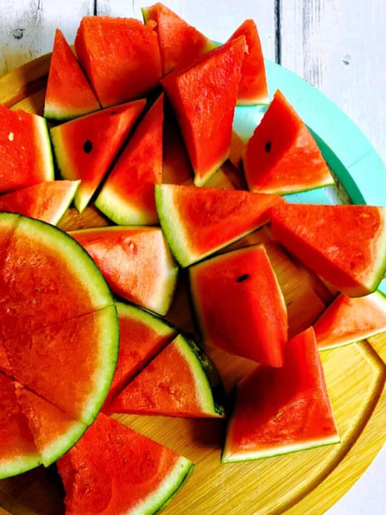 watermelon triangle slices on a cutting board