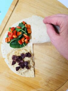 a tortilla being folded