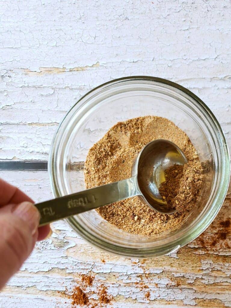 ingredients for chili seasoning substitute being mixed together