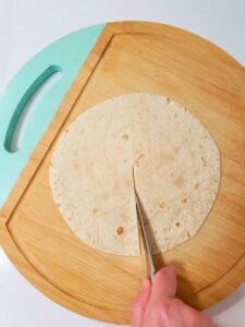 tortilla being sliced