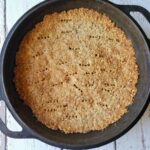 crumble pie crust in a cast iron pie plate