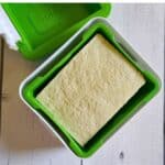 tofu being pressed