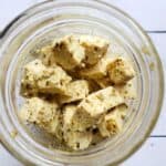 vegan feta cheese in a glass jar