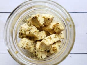 vegan feta cheese in a glass jar