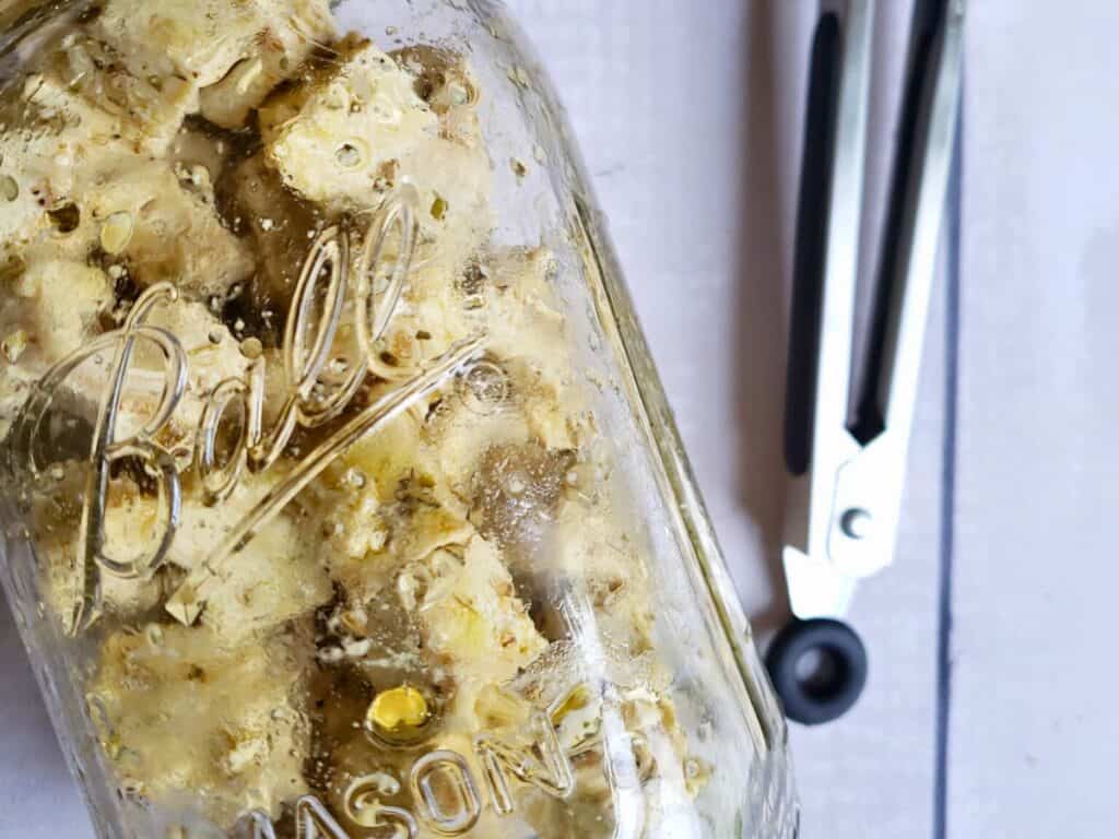 vegan feta in a glass jar