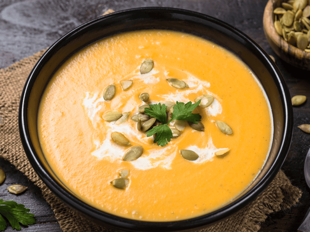 pumpkin soup drizzled with non dairy cream substitute