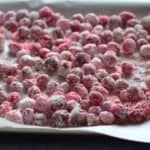candied cranberries on parchment paper