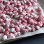 candied cranberries on a baking sheet