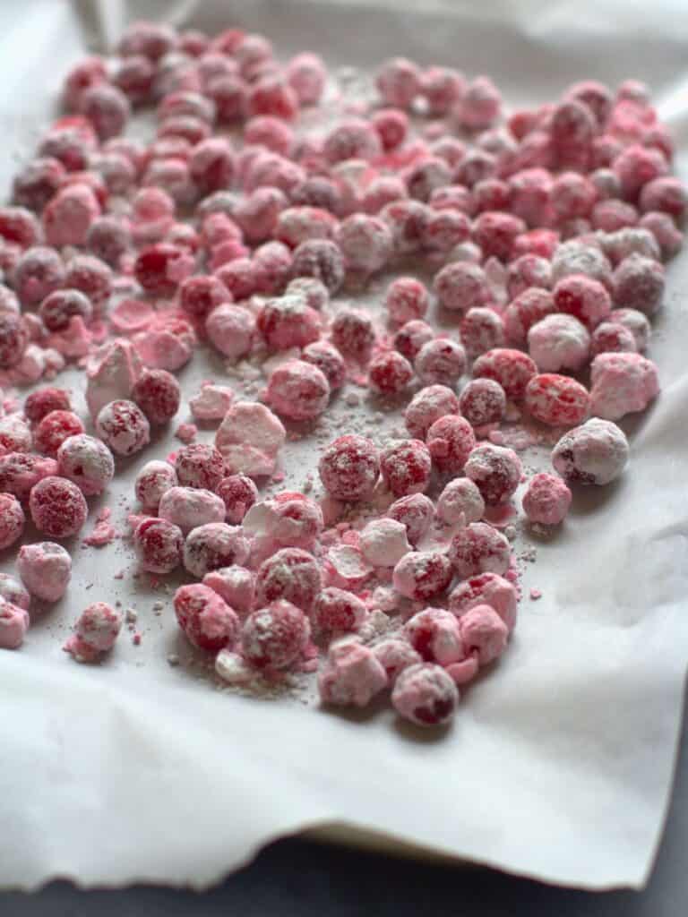 candied cranberries on a baking sheet