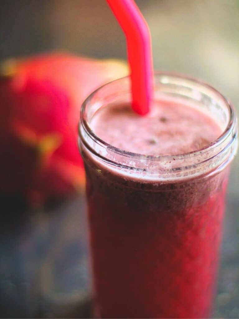 a glass of dragon fruit refresher