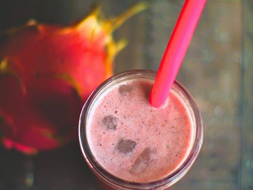 dragon fruit refresher in a glass with a straw