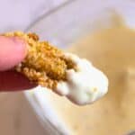 yogurt sauce on an air fried artichoke