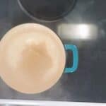 ramen noodles boiling in a pot