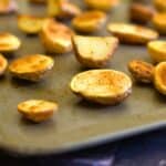 roasted mini potatoes on a baking sheet