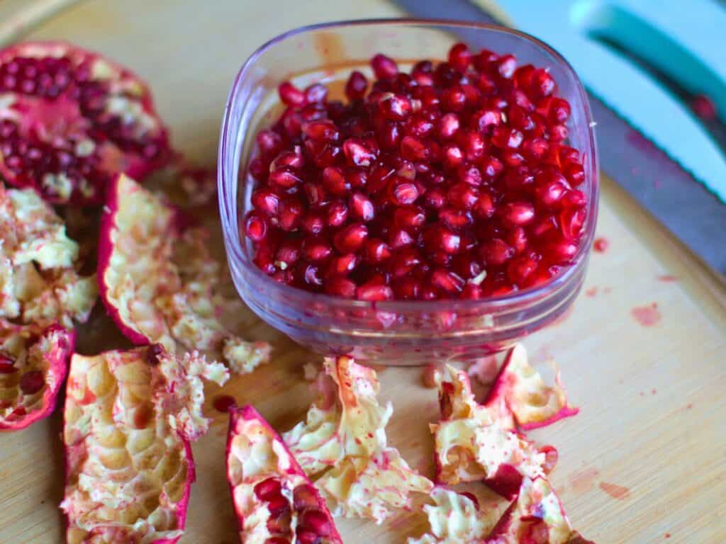 a bowl of pomegranate seeds