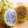 a yellow dragon fruit sliced open