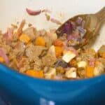 Sauteed vegetables in a stock pot