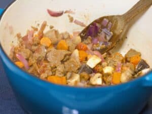 Sauteed vegetables in a stock pot
