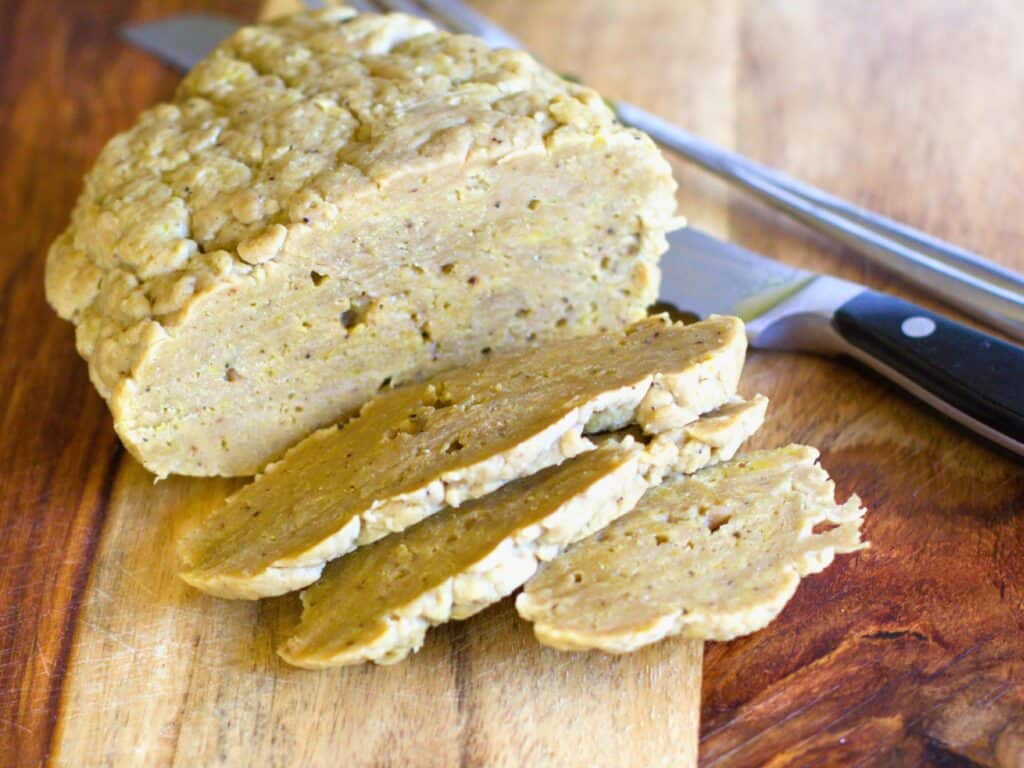 seitan sliced on a cutting board
