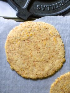 almond flour tortillas on parchment paper