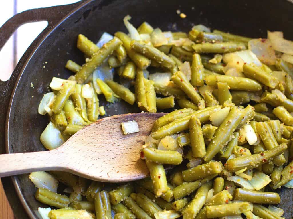 sauteed green beans in a skillet