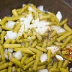 canned green beans in a skillet