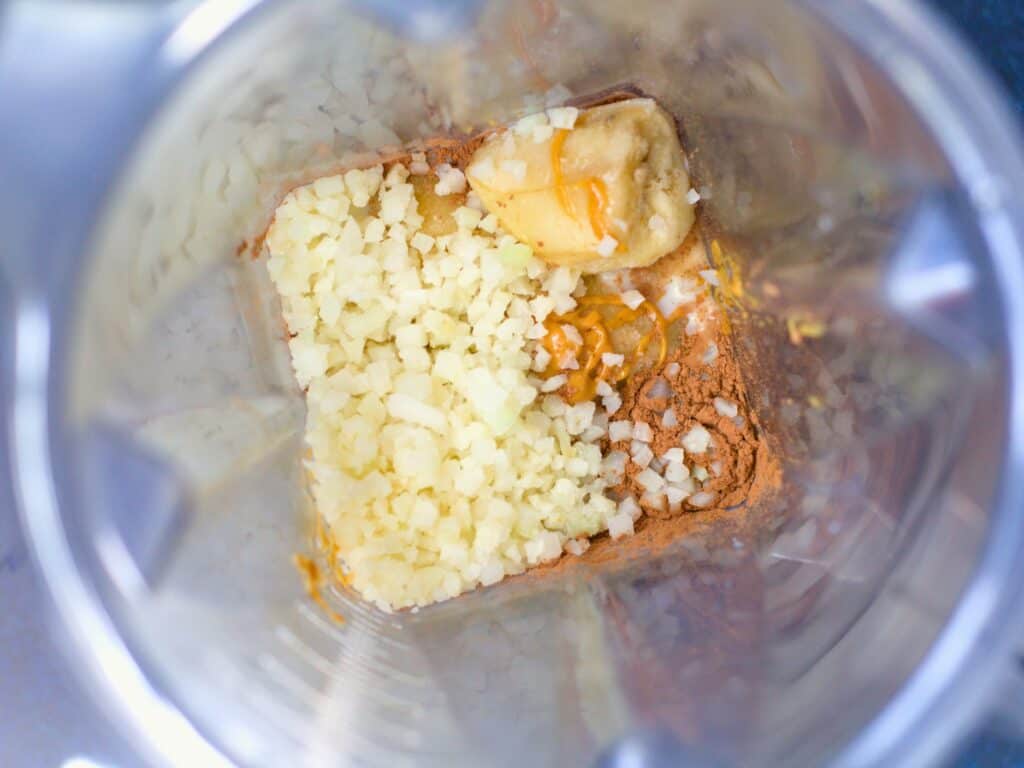 chocolate protein shake ingredients in a blender