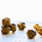 protein balls with a spoonful of peanut butter