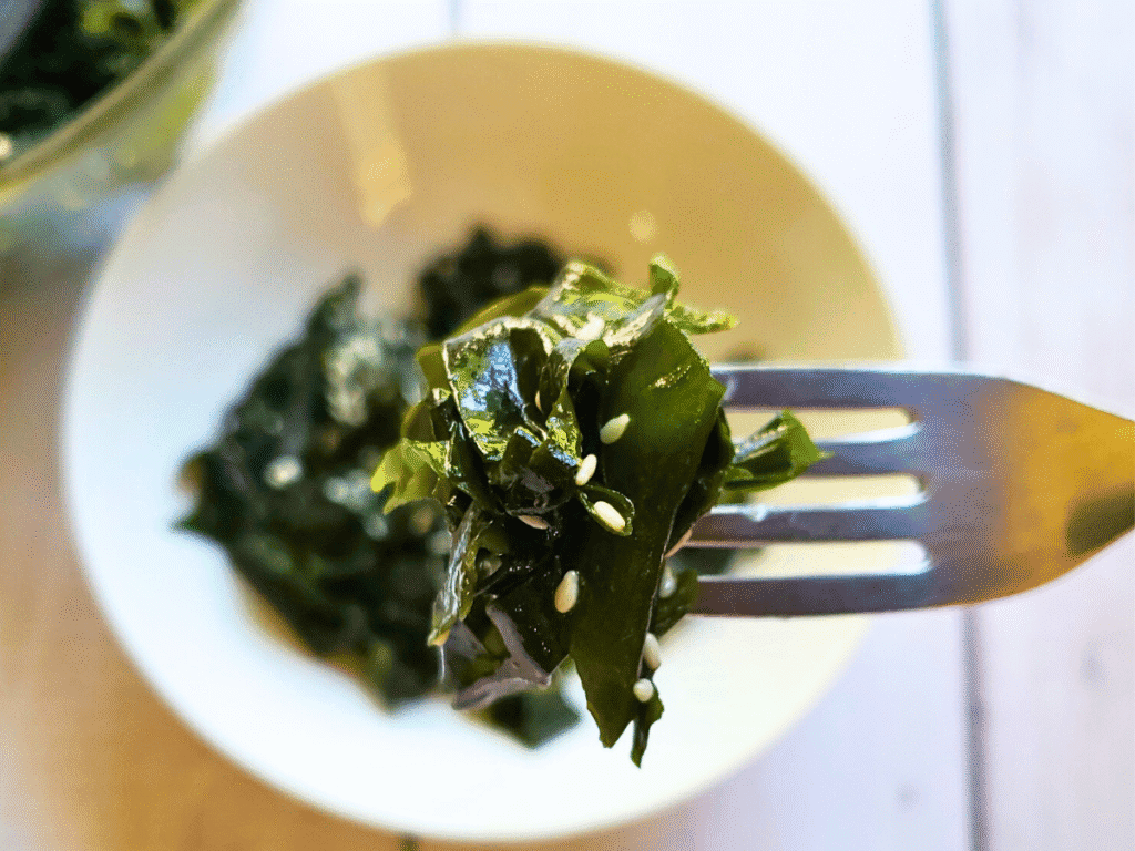 seaweed salad on a fork