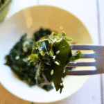 seaweed salad on a fork